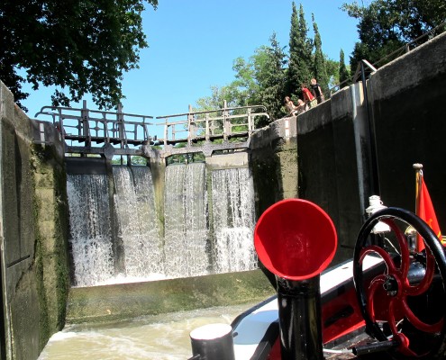 Passing through the lock on Tango Barge - Canal du Midi © Barge Vacations